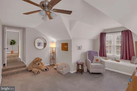 a bedroom with furniture and a couch
