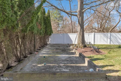 a view of swimming pool with seating area