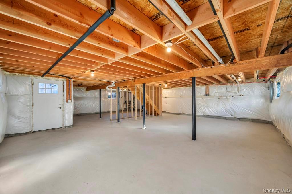 49 Barclay Road Mastic Beach, NY 11951 - Photo 32 of 33 a view of a room with wooden ceiling