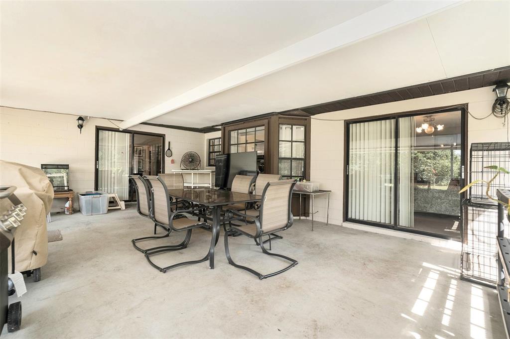 5960 Boyette Road Wesley Chapel, FL 33543 - Photo 22 of 32 a view of a livingroom with furniture and a window