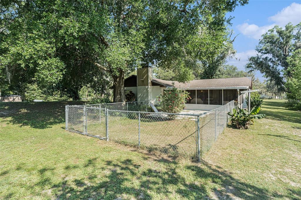 5960 Boyette Road Wesley Chapel, FL 33543 - Photo 25 of 32 swimming pool view with a seating space