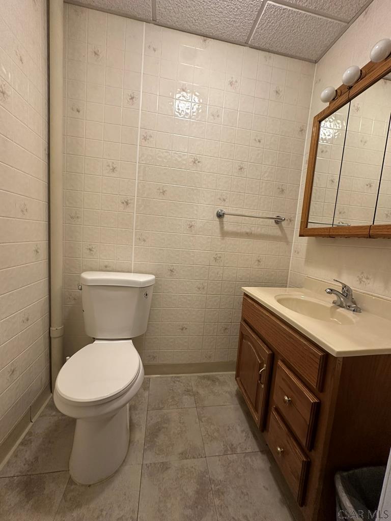 312 12th Street Windber, PA 15963 - Photo 8 of 24 a bathroom with a sink a toilet and shower