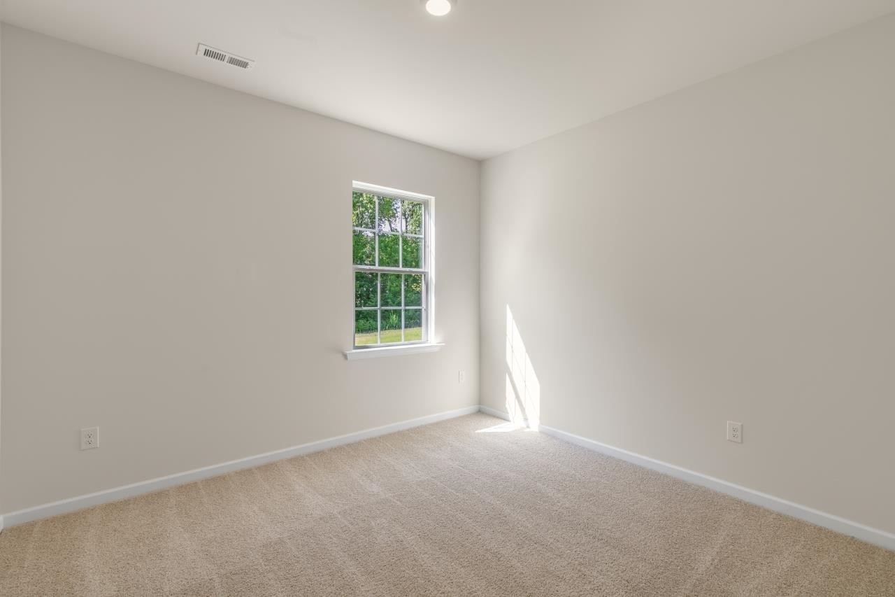 2129 Clydesmill Road Fayetteville, NC 28314 - Photo 20 of 37 an empty room with a window