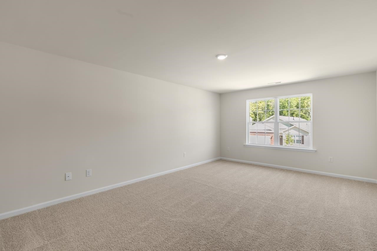 2129 Clydesmill Road Fayetteville, NC 28314 - Photo 23 of 37 an empty room with windows