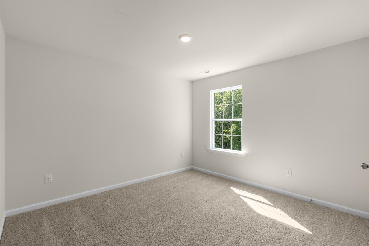 2129 Clydesmill Road Fayetteville, NC 28314 - Photo 32 of 37 an empty room with a window