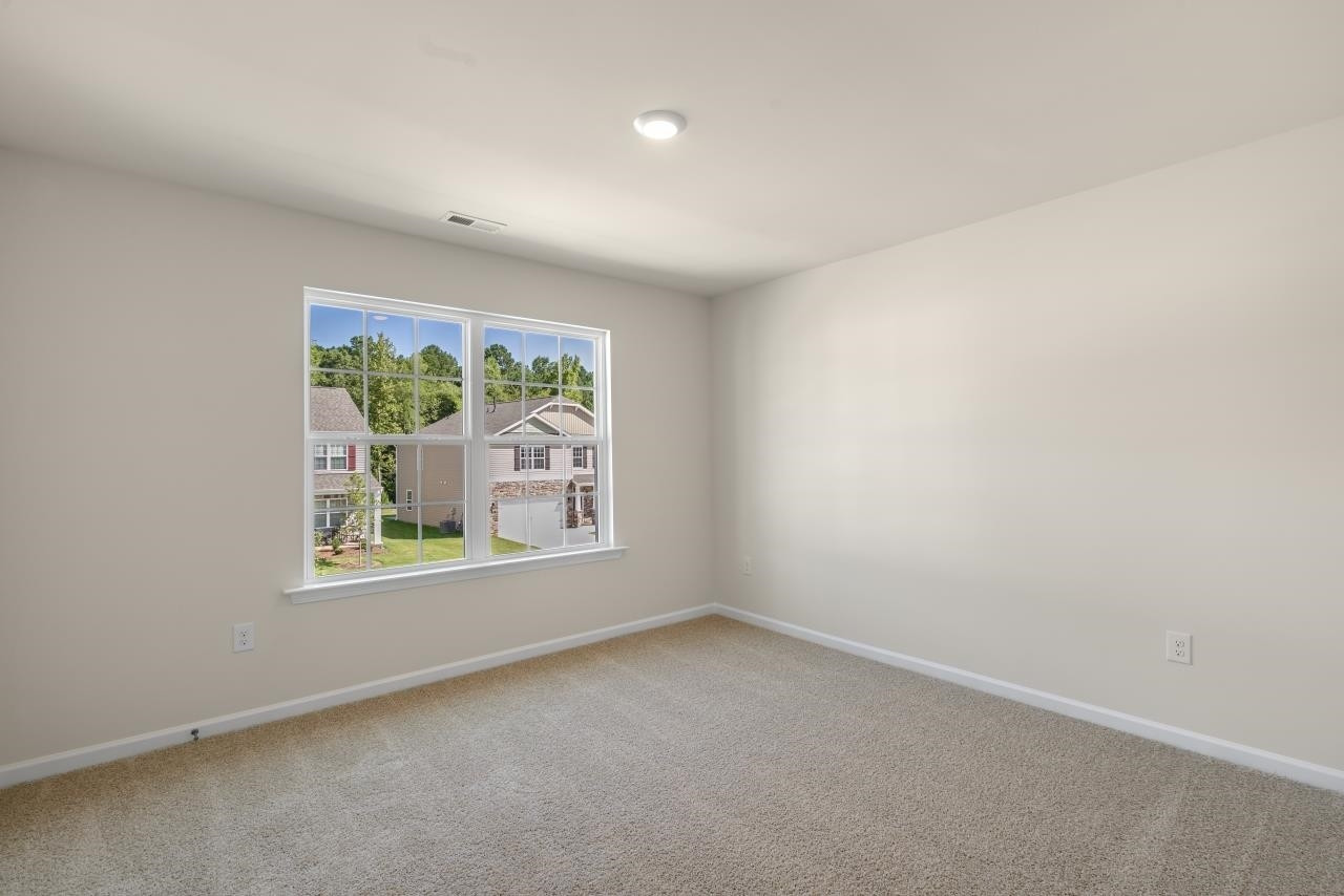 2129 Clydesmill Road Fayetteville, NC 28314 - Photo 36 of 37 an empty room with a window