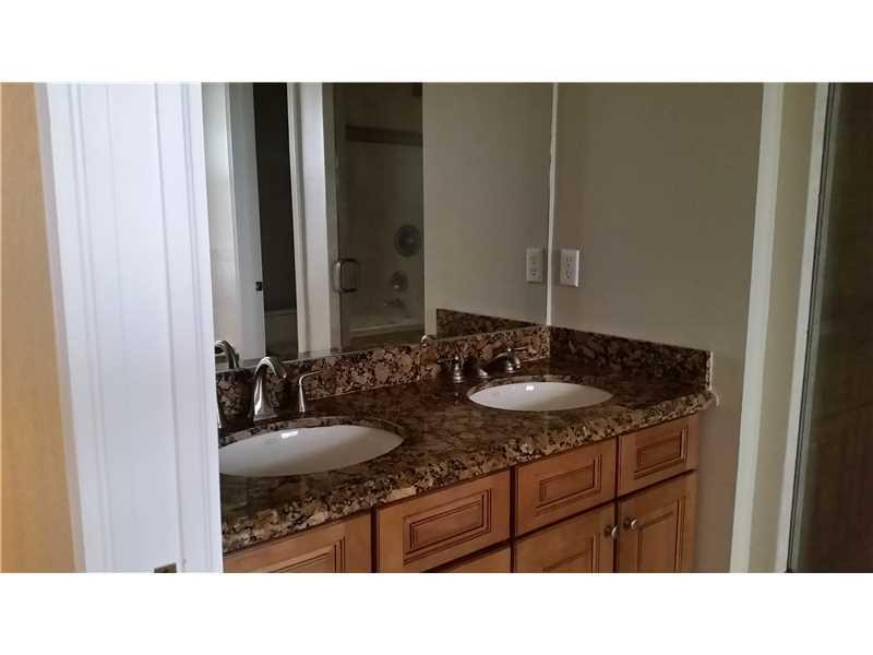 716 Northwest 83rd Place, Unit 716 Boca Raton, FL 33487 - Photo 12 of 17 Exterior Front.