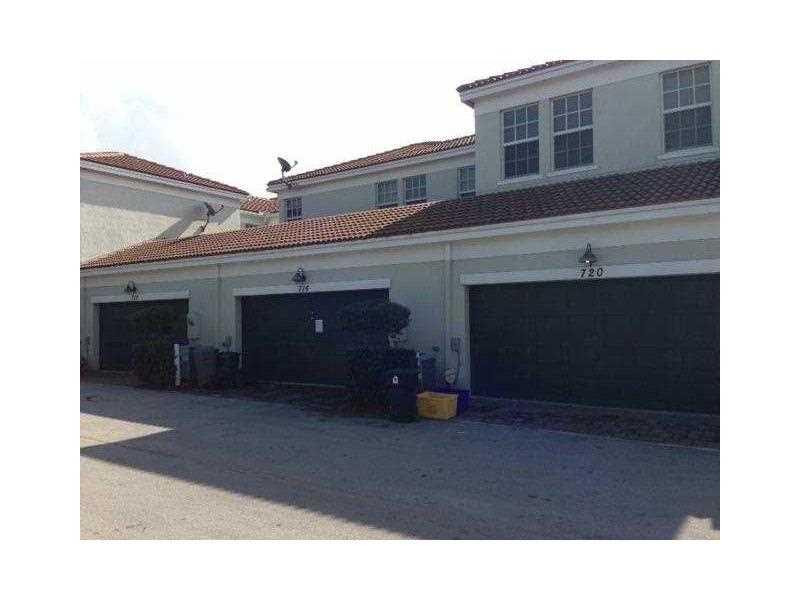 716 Northwest 83rd Place, Unit 716 Boca Raton, FL 33487 - Photo 2 of 17 Exterior Front.