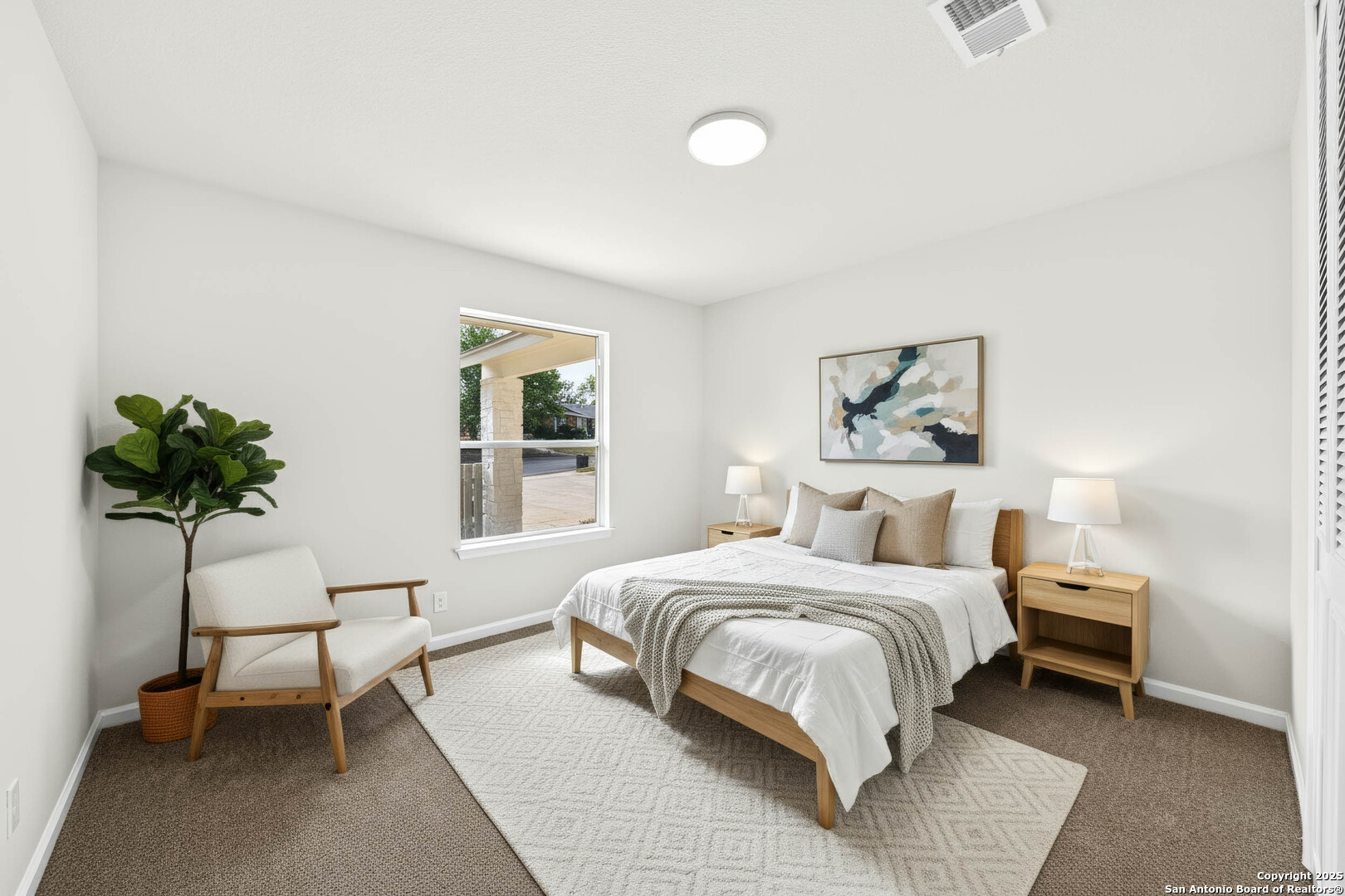 1106 Rio Linda Street San Antonio, TX 78245 - Photo 37 of 48 a bedroom with a bed and a potted plant