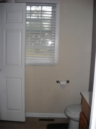 157 Cloran Street Springfield, MA 01109 - Photo 8 of 15 a bathroom with a toilet and a shower