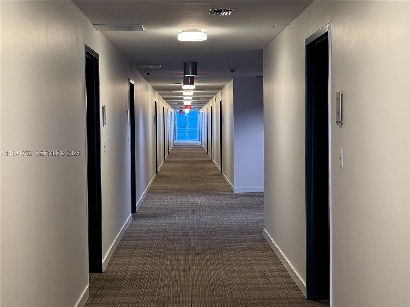 321 Northeast 26th Street, Unit 615 Miami, FL 33137 - Photo 11 of 22 a view of gallery with hallway