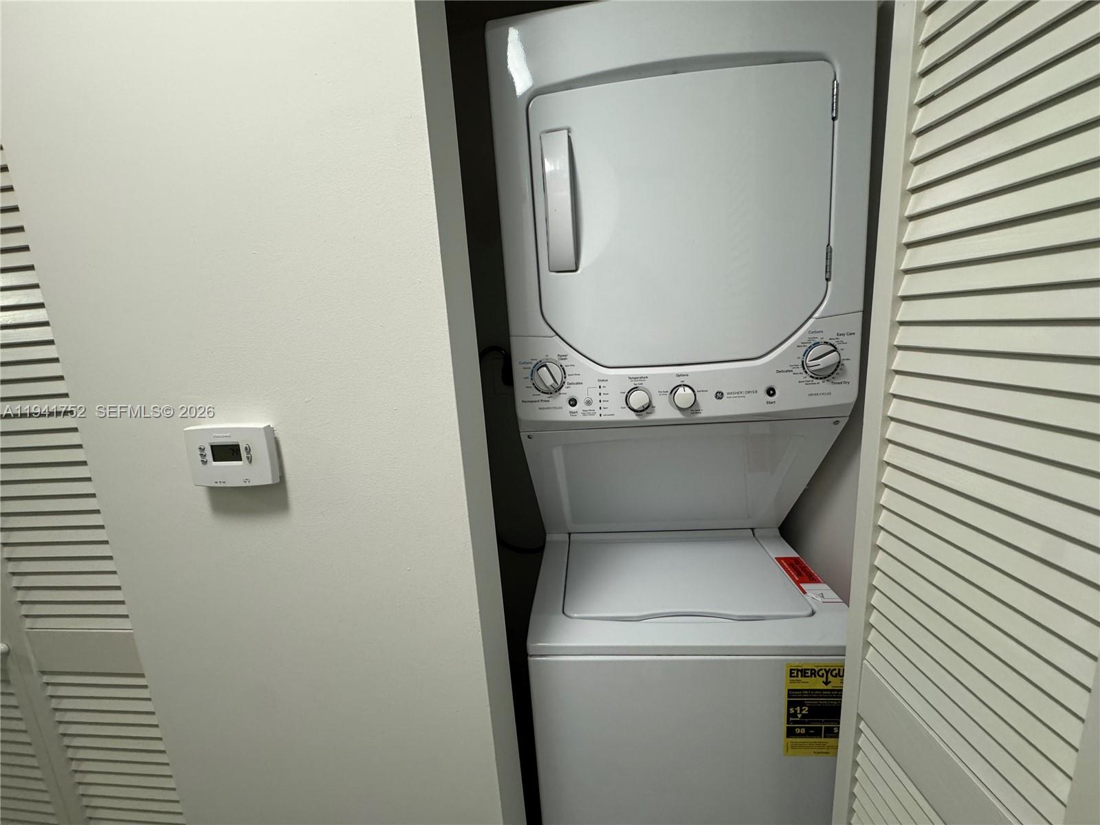 321 Northeast 26th Street, Unit 615 Miami, FL 33137 - Photo 10 of 22 a utility room with dryer and washer