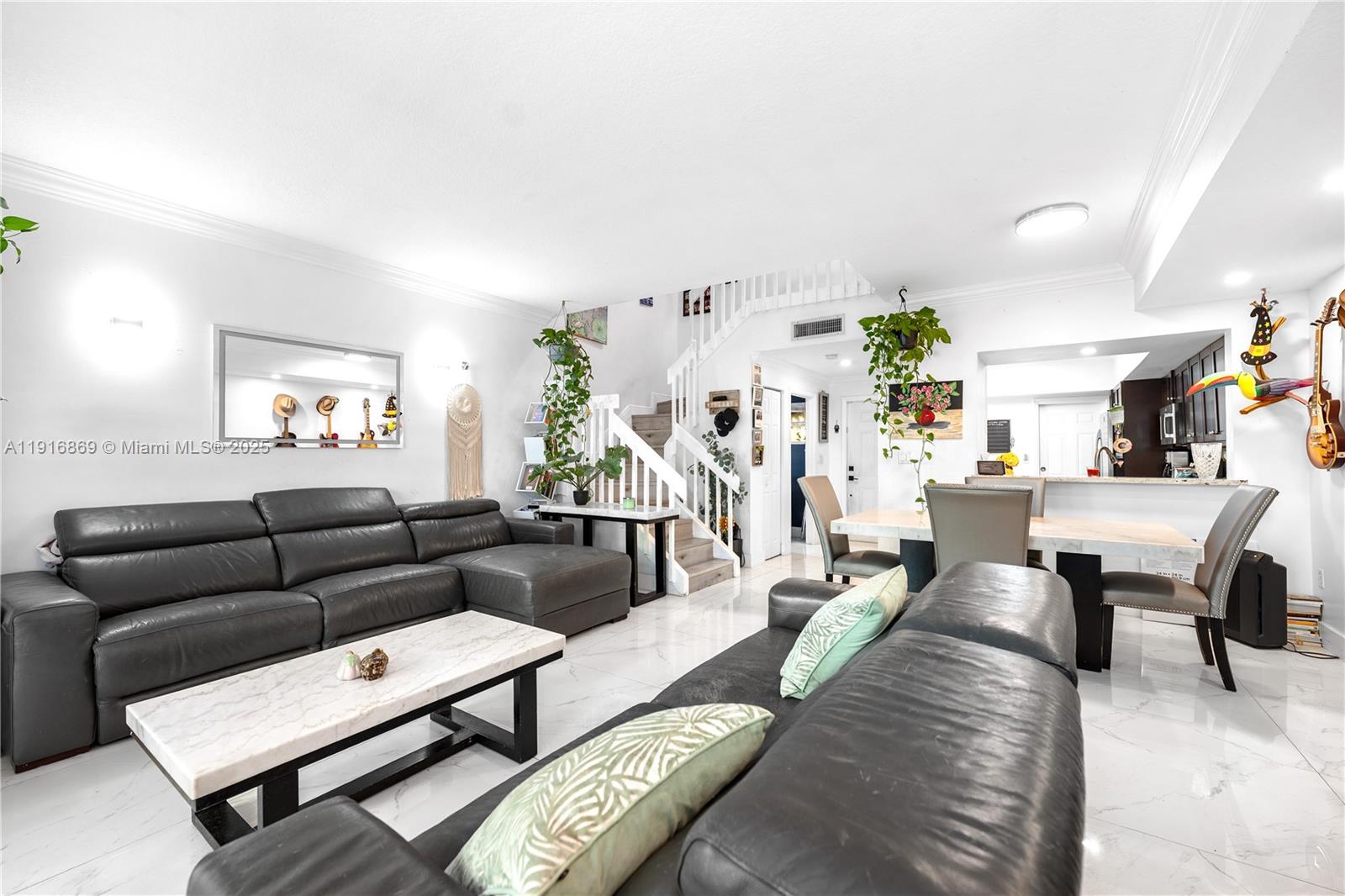 9985 Southwest 118th Place Miami, FL 33186 - Photo 19 of 30 a living room with furniture and wooden floor