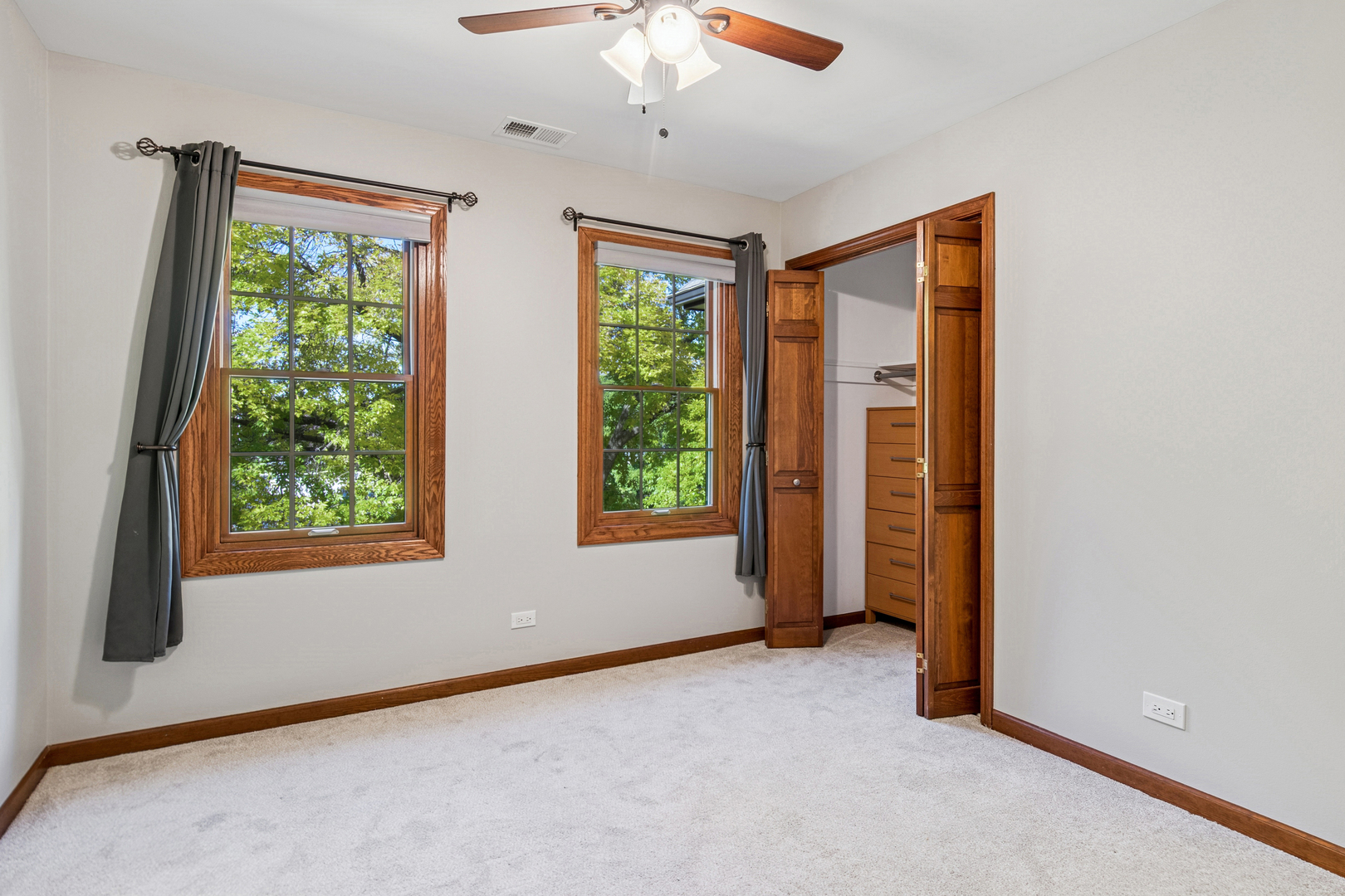 2230 Keim Road Naperville, IL 60565 - Photo 22 of 33 a view of an empty room with a window