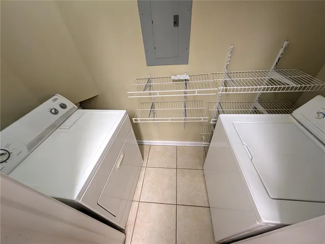 a utility room with a washer and dryer