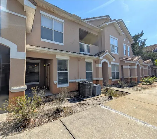 a front view of a house with yard
