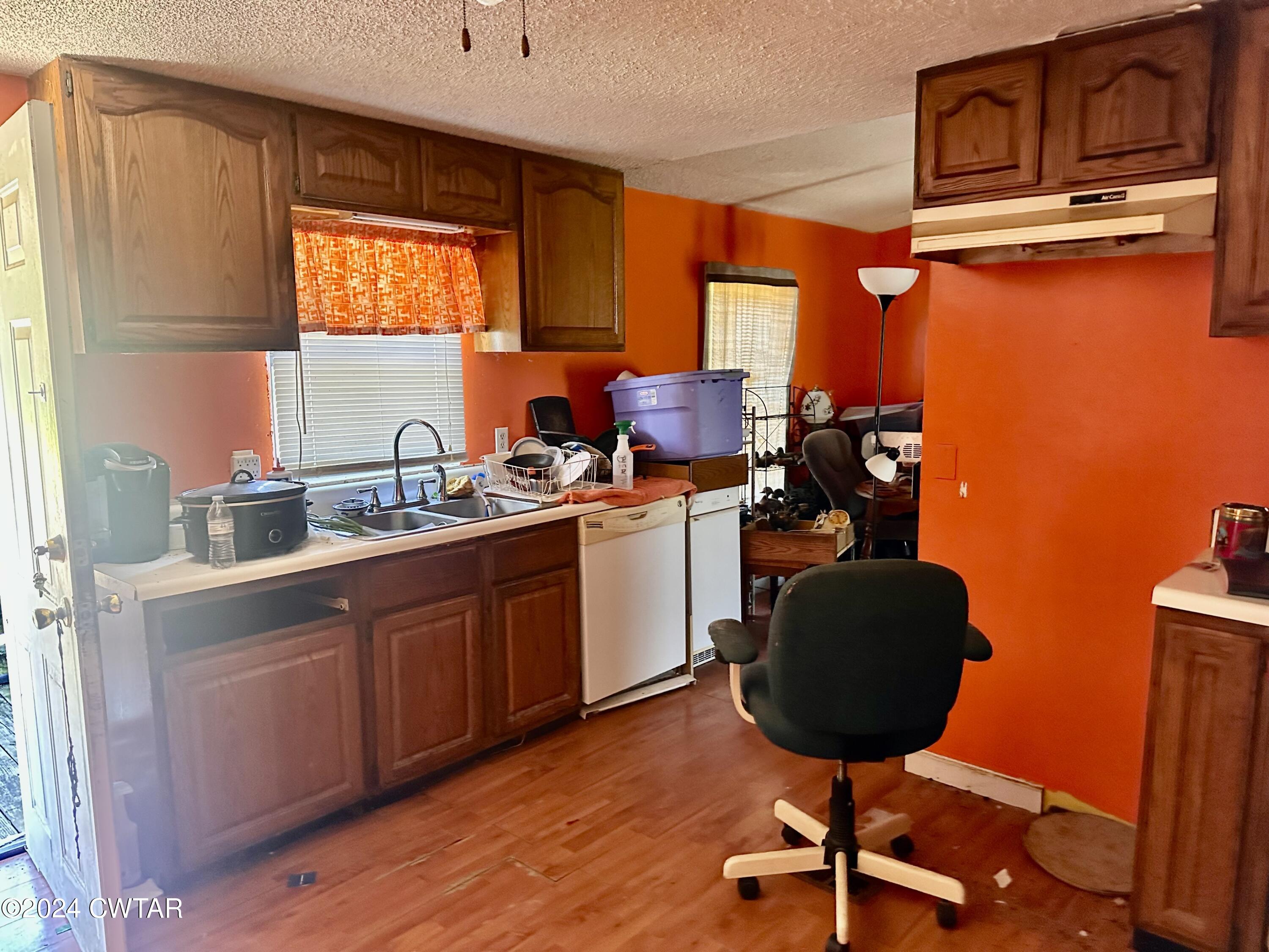 891 Dean Hill Road Hornbeak, TN 38232 - Photo 9 of 12 a kitchen with a sink cabinets and window