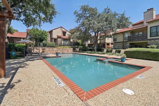 a view of a house with swimming pool