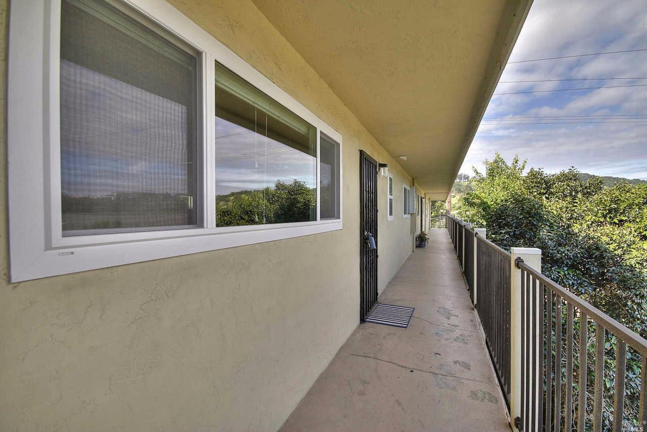 260 Merrydale Road, Unit 28 San Rafael, CA 94903 - Photo 1 of 1 a view of a pathway both side of house