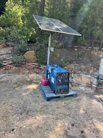a view of a street with large trees