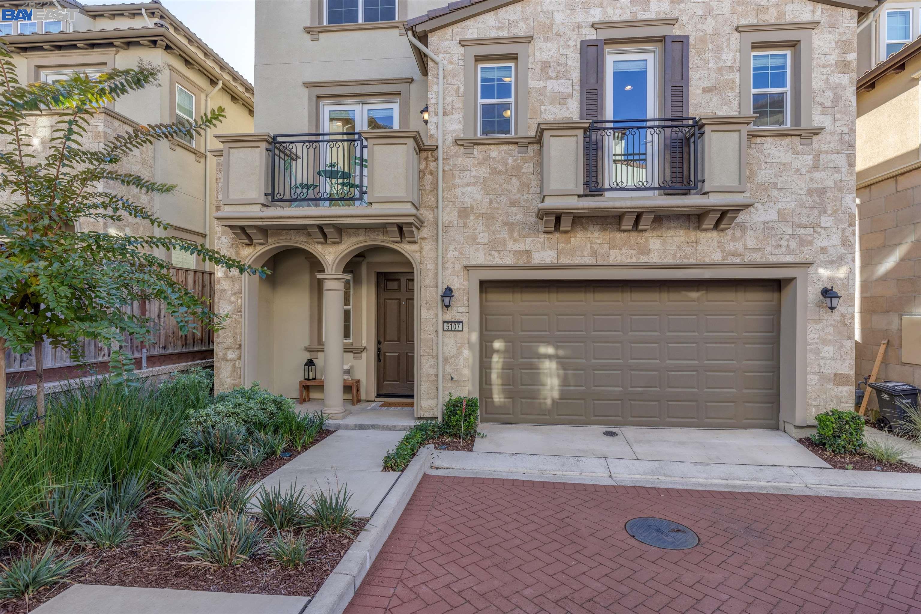 5107 Rowan Drive San Ramon, CA 94582 - Photo 1 of 1 a front view of a house with a yard and garage