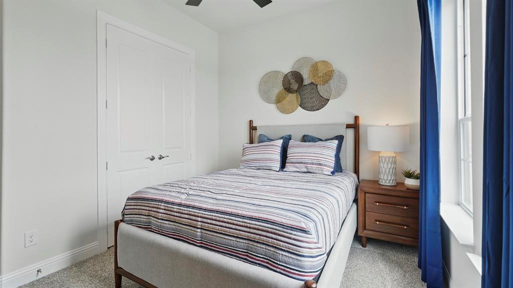 1016 Pitchfork Road Royse City, TX 75189 - Photo 23 of 35 a bedroom with a bed and cabinets