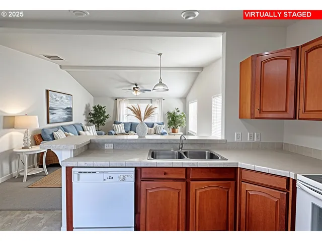 a bedroom with a large bed and a couch