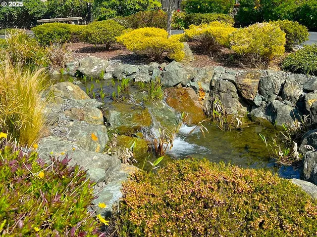 a view of swimming pool with outdoor seating