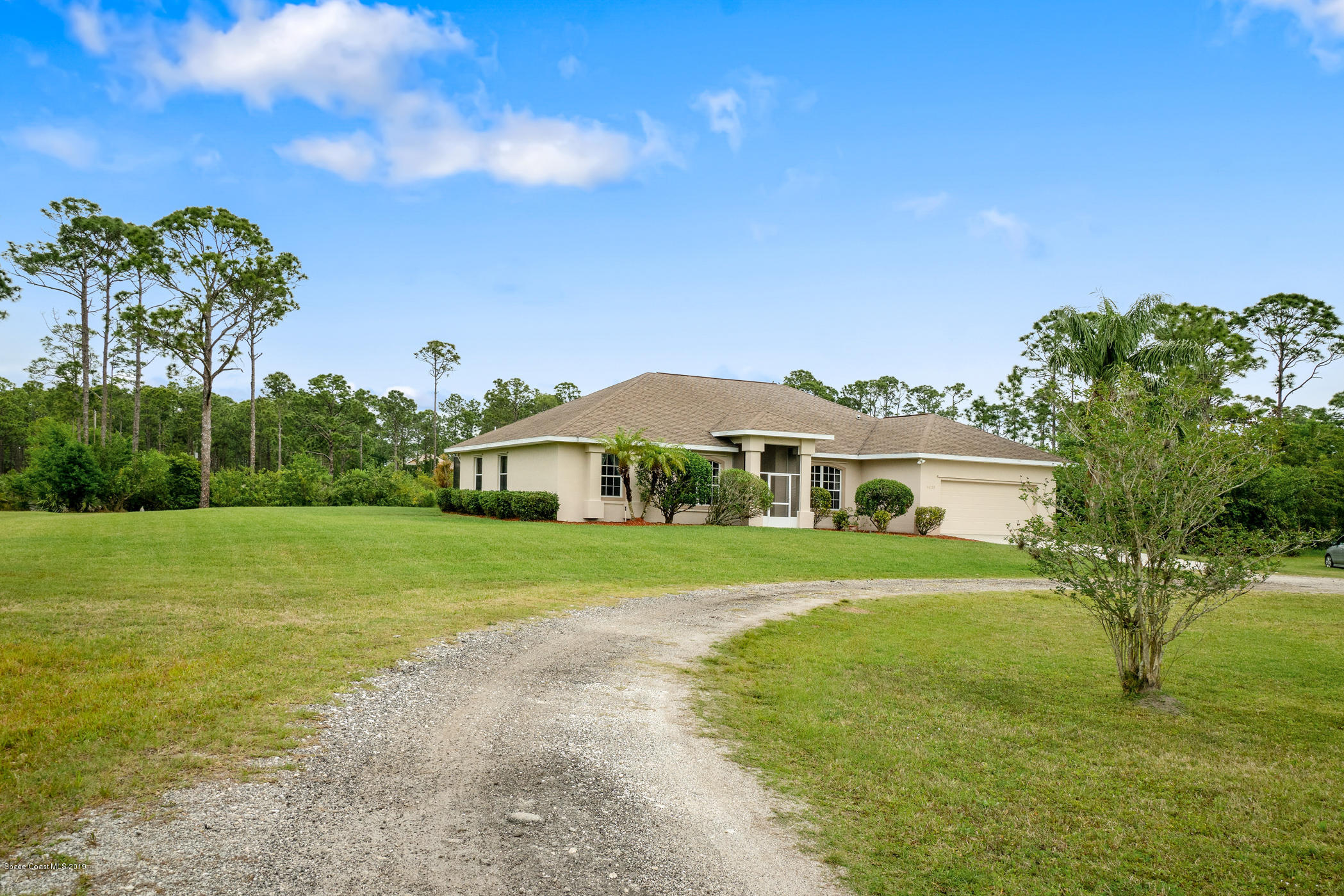 4035 Hield Road Northwest Palm Bay, FL 32907 - Photo 35 of 47 Side Front View