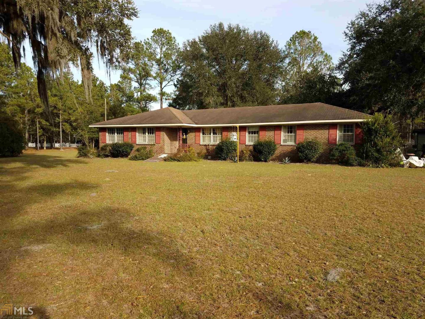 578 Lee Road Pembroke, GA 31321 - Photo 1 of 1 front view of a house with a yard