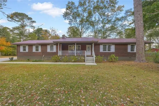 a house view with a garden space