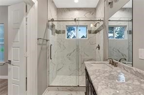 6814 Dumble Street, Unit A Houston, TX 77021 - Photo 11 of 22 a bathroom with a granite countertop shower sink and vanity