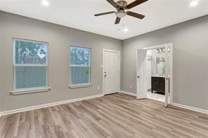 6814 Dumble Street, Unit A Houston, TX 77021 - Photo 9 of 22 a view of an empty room with a window