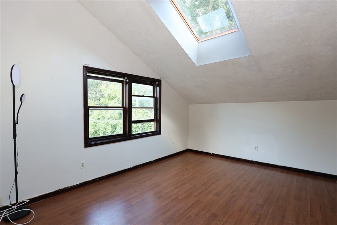7-9 Salter Place Rochester, NY 14613 - Photo 12 of 25 The upstairs apartment with skylight brings additi