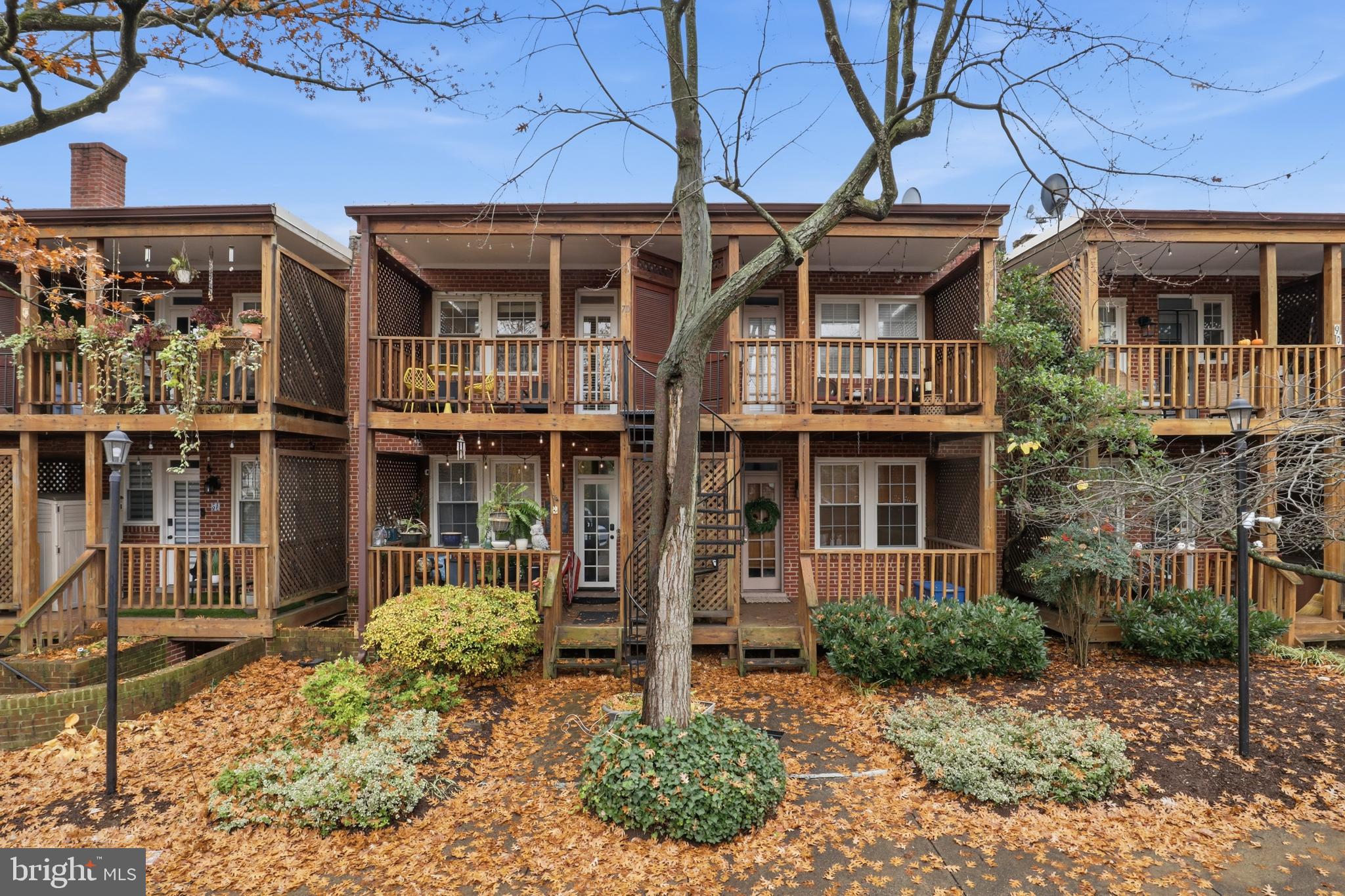 7 Russell Road, Unit D Alexandria, VA 22301 - Photo 21 of 27 front view of a building with a yard