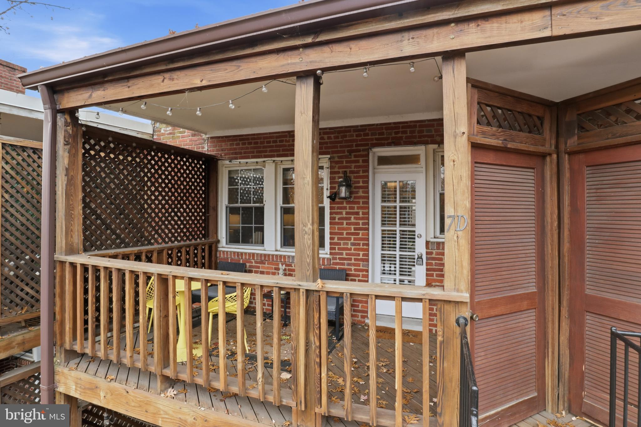 7 Russell Road, Unit D Alexandria, VA 22301 - Photo 22 of 27 a view of a brick house with large windows