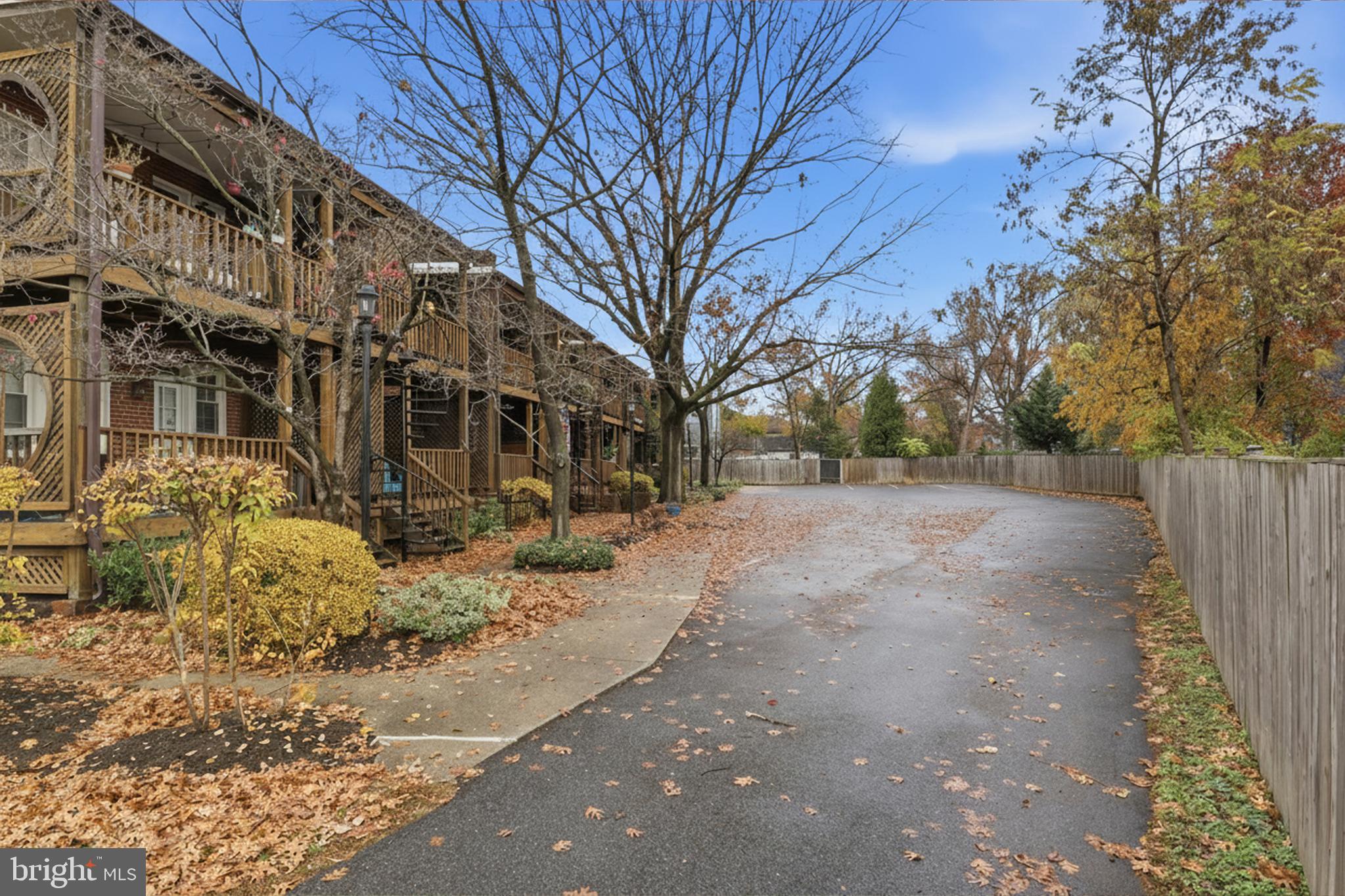 7 Russell Road, Unit D Alexandria, VA 22301 - Photo 23 of 27 a view of a yard with a house