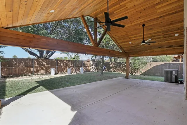 a view of backyard with green space