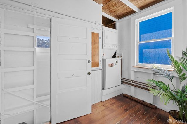 a hallway with cabinets