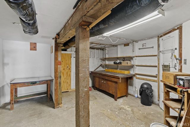 a view of a building with outdoor seating