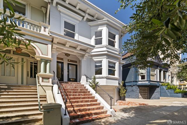 a front view of a multi story residential apartment building