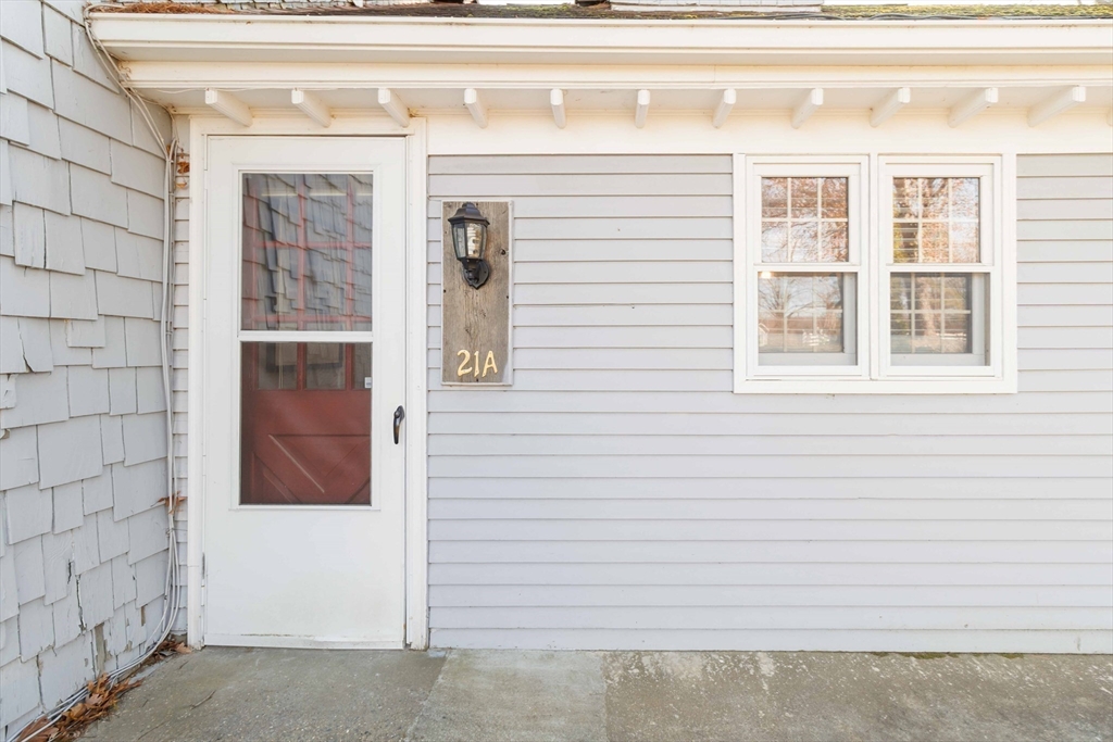 21 A Stowe Road, Unit A Southborough, MA 01772 - Photo 7 of 24 a view of front door