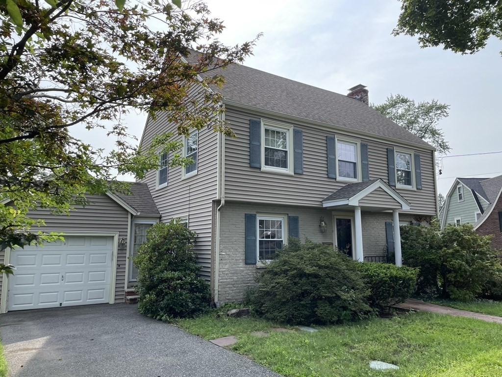 front view of a house and a yard