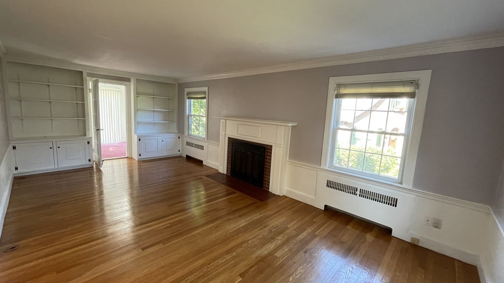 10 Weldon Road Newton, MA 02458 - Photo 22 of 23 wooden floor in an empty room with a window