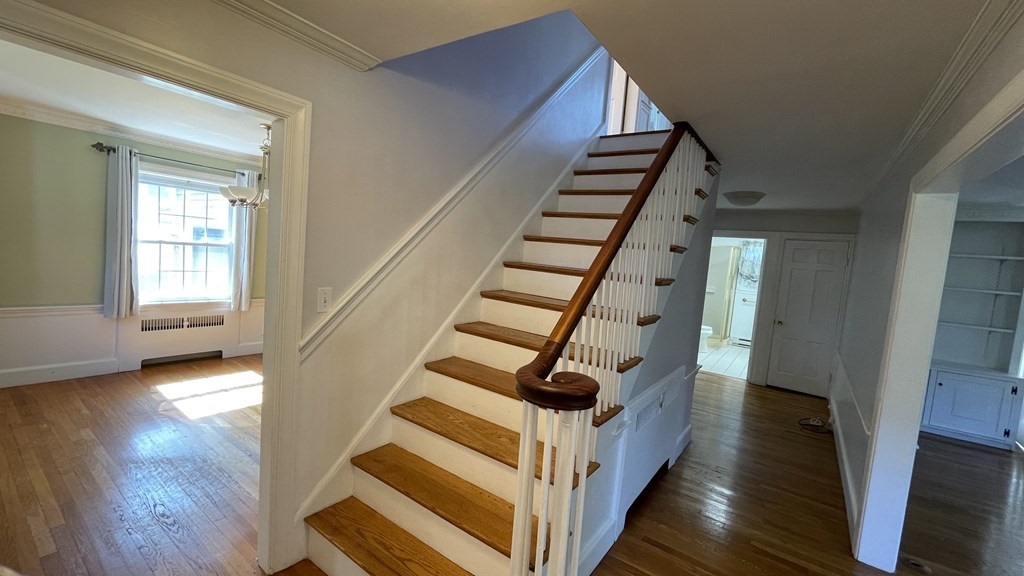 10 Weldon Road Newton, MA 02458 - Photo 23 of 23 a view of entryway with wooden floor and stairs