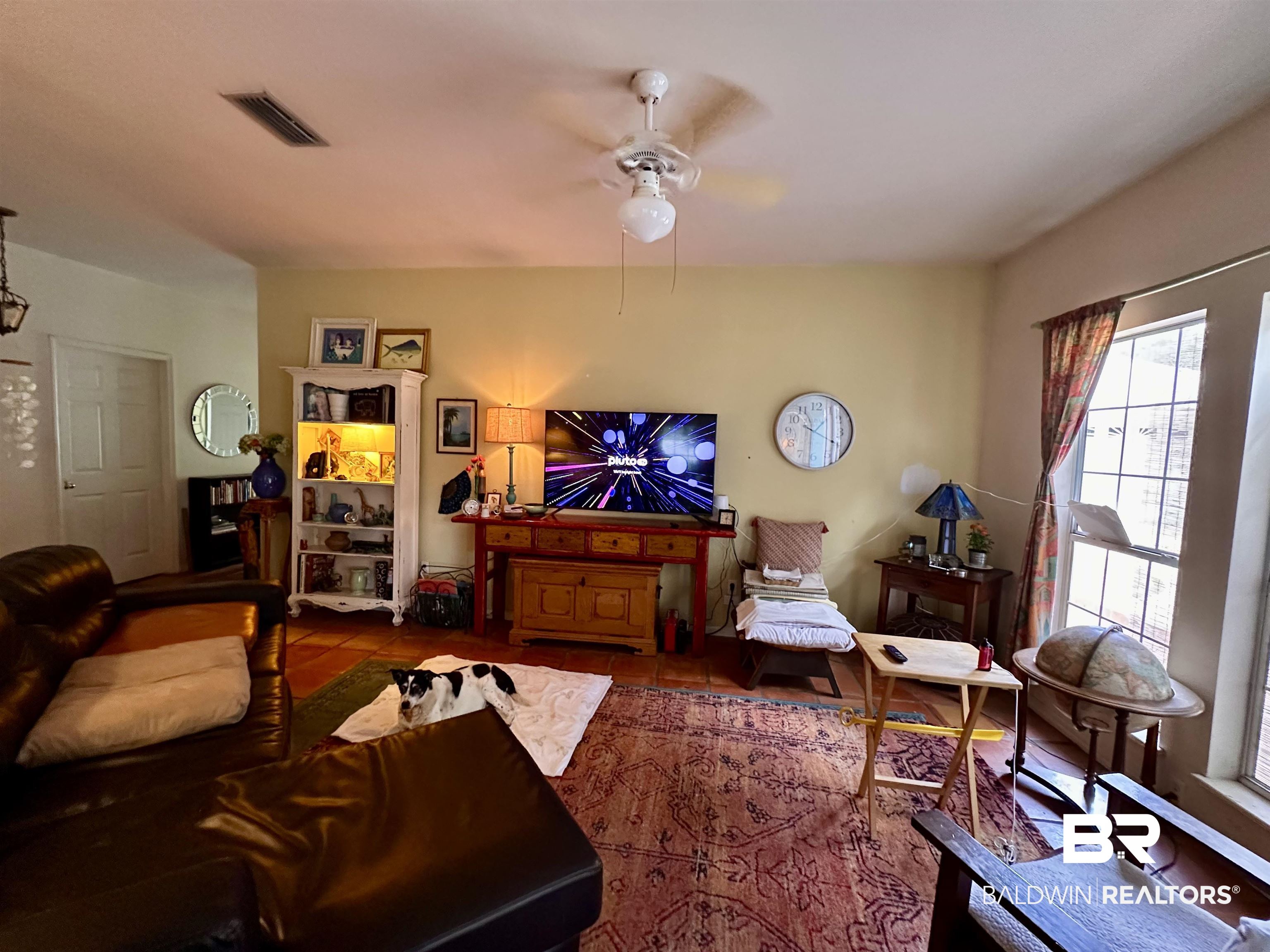 9101 Coronada Road Elberta, AL 36530 - Photo 5 of 27 Living room featuring a ceiling fan