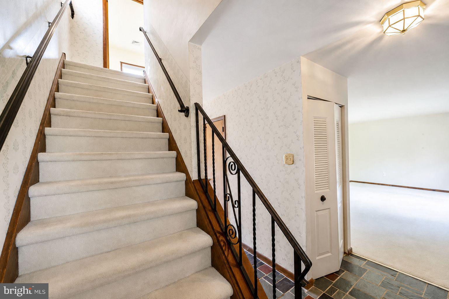 223 Trythall Road Elverson, PA 19520 - Photo 34 of 78 Inviting staircase to upper living spaces.