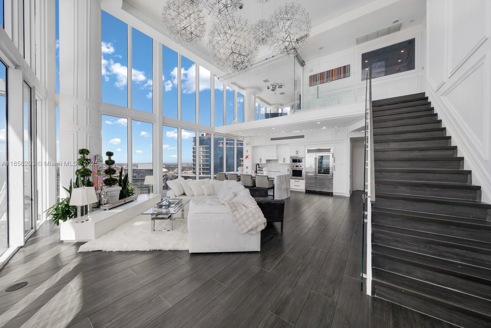 888 Biscayne Boulevard, Unit 5701 Miami, FL 33132 - Photo 11 of 35 a view of living room with furniture and entryway
