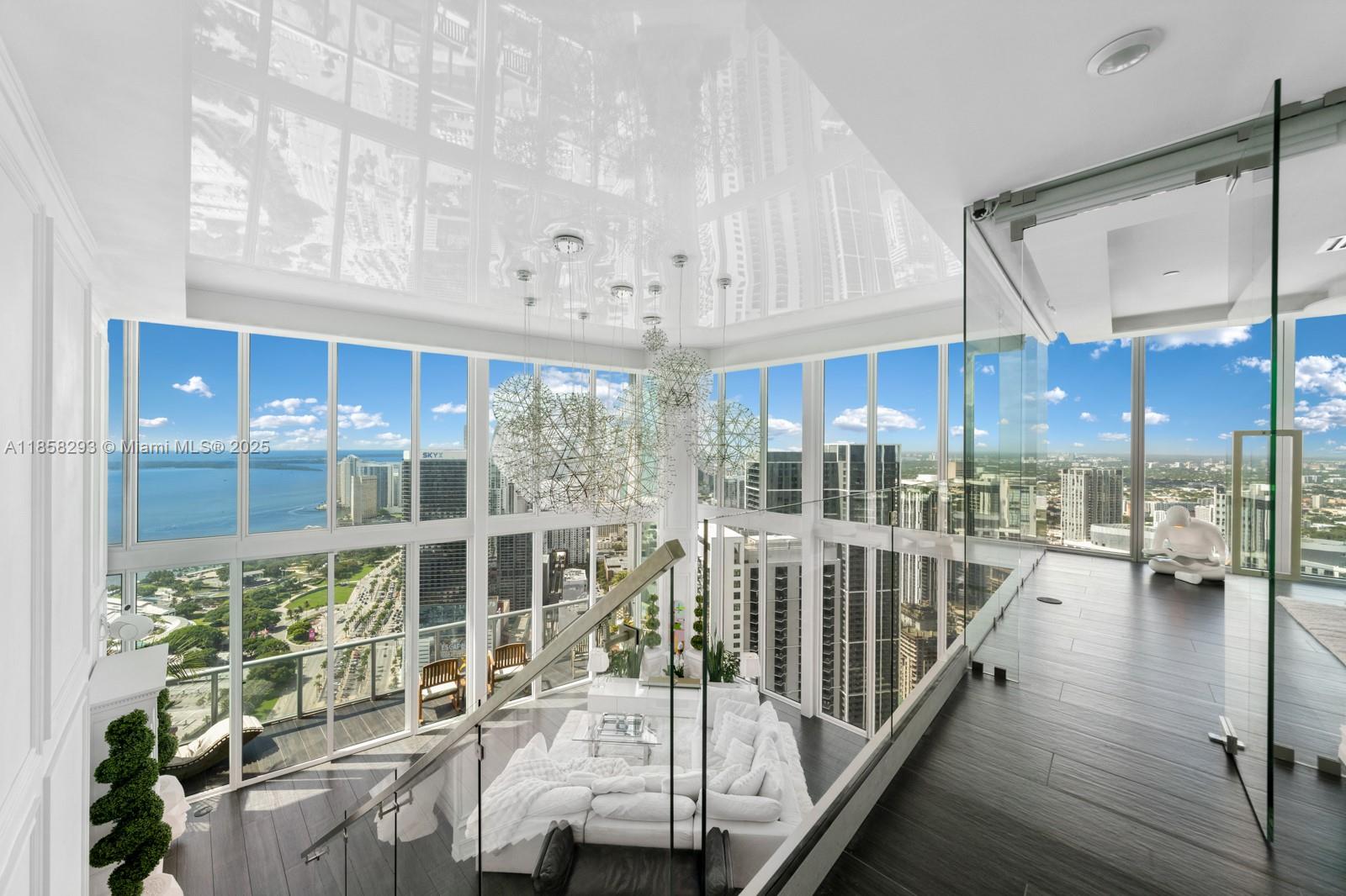 888 Biscayne Boulevard, Unit 5701 Miami, FL 33132 - Photo 13 of 35 a view of a living room and balcony
