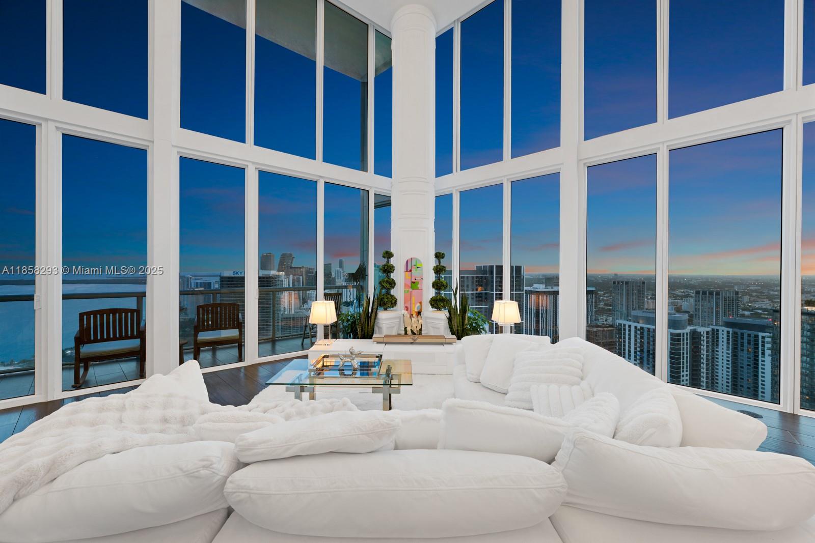 888 Biscayne Boulevard, Unit 5701 Miami, FL 33132 - Photo 28 of 35 a living room with furniture windows and a large window